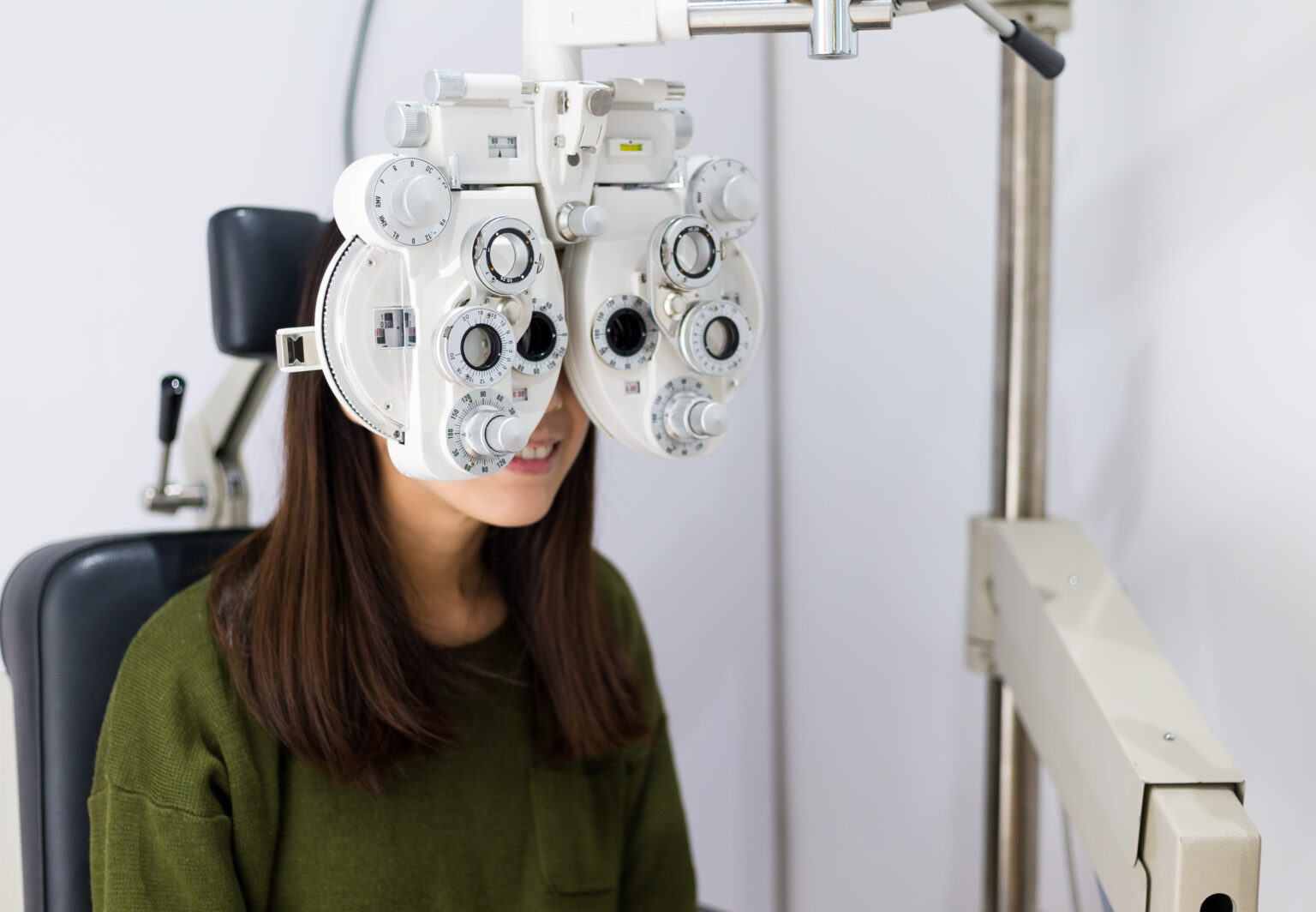 Woman getting a comprehensive eye exam